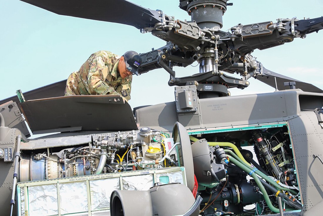 Black Hawk rotor head and engine bay during maintenance. U.S. Army photo.