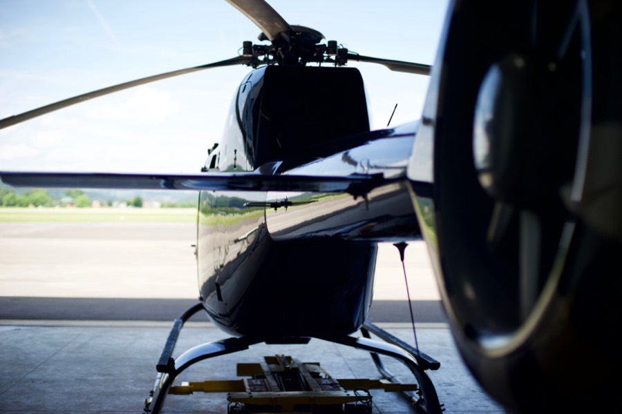UH-60 Black Hawk helicopter inside a maintenance hangar